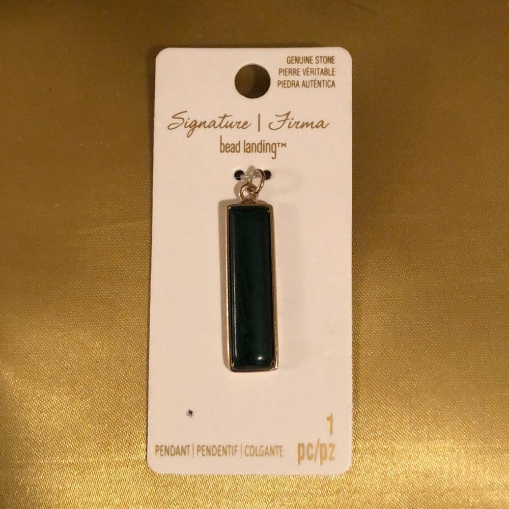 NWT pendant by bead landing